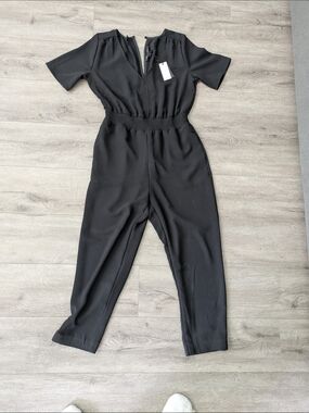 Elegant Black Smocked-Waist Jumpsuit with V-Neck